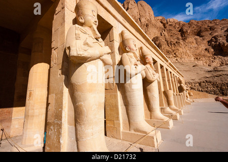 Statues of the god Osiris at Hapshetpsut' Temple, Luxor, Egypt Stock Photo