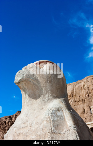The statue of Nekhbet in vulture form guardian the entrance to the upper tier of Queen Hatshepsut's Temple in Luxor, Egypt Stock Photo