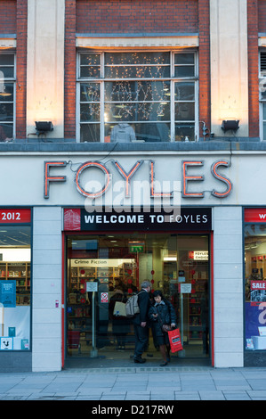The front of Foyles Bookshop Charing Cross Road London UK at dusk so the lights are visible Stock Photo