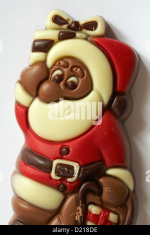 Father Christmas Santa Claus chocolate lolly ready for Christmas on white background Stock Photo