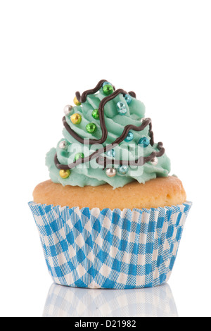 Colorful Christmas cupcake with balls and tree Stock Photo
