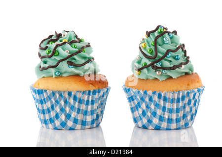 Colorful Christmas cupcakes with balls and tree Stock Photo