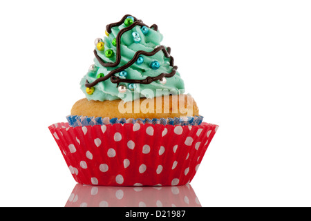 Colorful Christmas cupcake with balls and tree Stock Photo