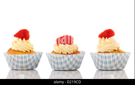 Strawberry cupcakes with buttercream isolated over white background Stock Photo
