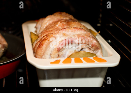 the meat is baked in the oven Stock Photo
