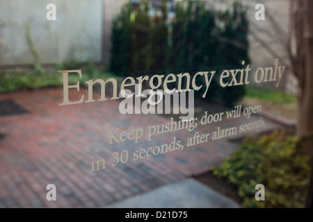 Emergency exit sign Stock Photo