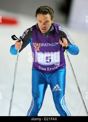 AATENTION: EMBARGO CONDITION: 10 JANUARY, 22:00 O'CLOCK - TV presenter and musician Stefan Mross in action during the Star Biathlon in Ruhpolding, Germany, 09 January 2013. Celebreties and biathlete legends competed in the Star Biathlon, which was held after the Biathlon World Cup. Photo: TOBIAS HASE Stock Photo