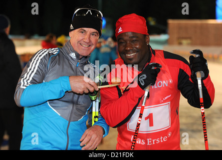 AATENTION: EMBARGO CONDITION: 10 JANUARY, 22:00 O'CLOCK - Former biathlete Fritz Fischer (L) and chef Nelson Mueller pose during the Star Biathlon in Ruhpolding, Germany, 09 January 2013. Celebreties and biathlete legends competed in the Star Biathlon, which was held after the Biathlon World Cup. Photo: TOBIAS HASE Stock Photo