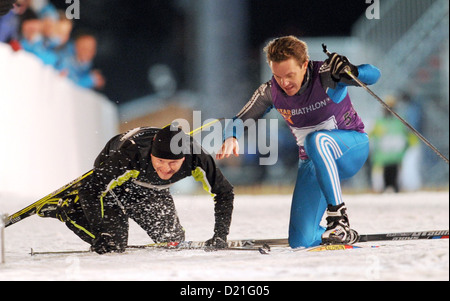 AATENTION: EMBARGO CONDITION: 10 JANUARY, 22:00 O'CLOCK - Weather presenter Sven Ploeger (L) and musician Stefan Mross in action during the Star Biathlon in Ruhpolding, Germany, 09 January 2013. Celebreties and biathlete legends competed in the Star Biathlon, which was held after the Biathlon World Cup. Photo: TOBIAS HASE Stock Photo