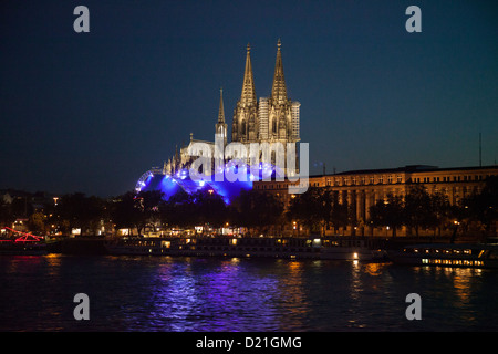 Cologne Cathedral and Cologne Musical Dome at night seen from Rhine river cruise ship MS Bellevue, Cologne, North Rhine-Westphal Stock Photo