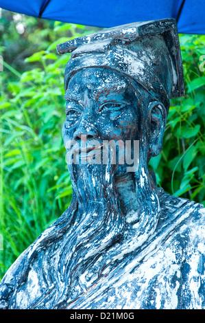 A chinese statue in temple gardens of Hua hin, Thailand Stock Photo