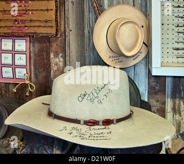 Cowboy hats identified and signed by owners at Rodeo and Brand Room at West of the Pecos Museum in Pecos, Texas, USA Stock Photo