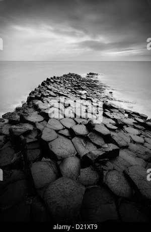 Black & white long exposure over the rocks and sea at the famous Giant's Causeway in Northern Ireland