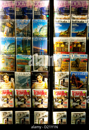 Stack of magazines with red cover Stock Photo - Alamy