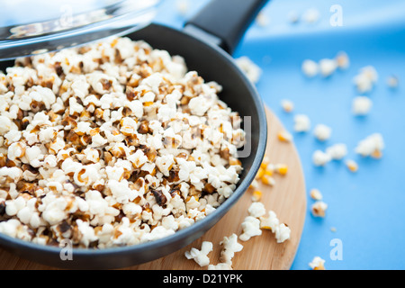 corn kernels in a frying pan, popcorn Stock Photo