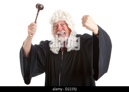 British judge in white wig, waving his gavel around in frustration and anger. Isolated on white.  Stock Photo