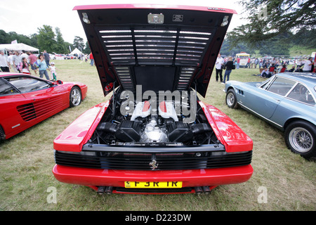 A Ferrari 512 TR (Testarossa) showing the 4.9 Litre V12 engine in all it's highly polished glory at a Wiltshire car Show Stock Photo