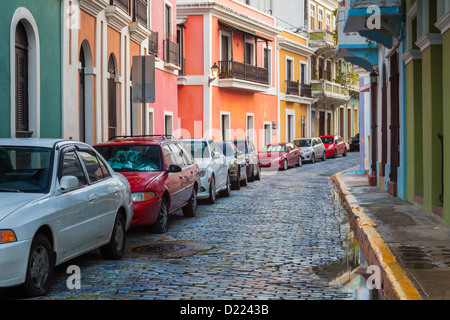 The old cobblestone streets of Old San Juan are barely wide enough for modern cars, Puerto RIco Stock Photo