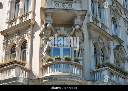 House balkony with two stone telamons in Zagreb, Croatia. Stock Photo