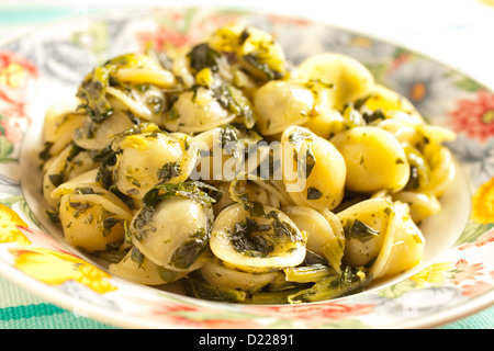 orecchiette with turnip greens: Orecchiette con cime di rapa Stock Photo