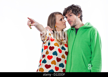 Young couple pointing at something Stock Photo