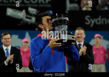 Sydney, Australia. 12th January 2013. Bernard Tomic (AUS) celebrates his first title win after defeating Kevin Anderson (RSA) during the mens final at the Apia International Tennis Tournament from the Sydney Olympic Park. Tomic won 6-3,6-7,6-3 Stock Photo