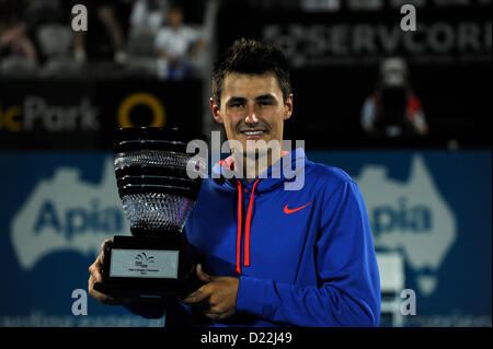 Sydney, Australia. 12th January 2013. Bernard Tomic (AUS) celebrates his first title win after defeating Kevin Anderson (RSA) during the mens final at the Apia International Tennis Tournament from the Sydney Olympic Park. Tomic won 6-3,6-7,6-3 Stock Photo
