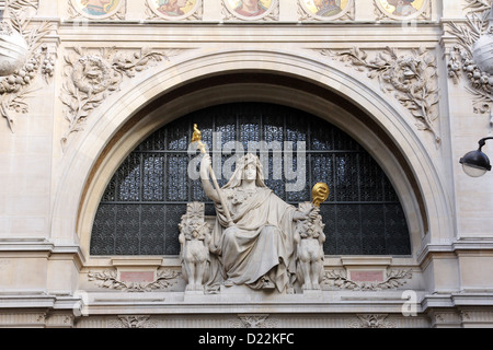 Statue of prudence on the BNP building in Paris on Nov 11, 2012 in Paris. Stock Photo