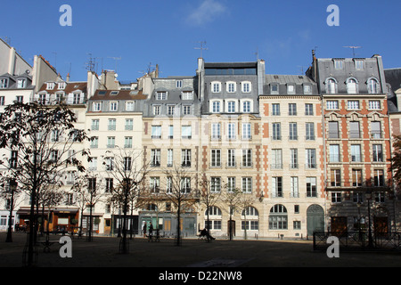 Facade of a traditional apartment building in Paris, France Stock Photo