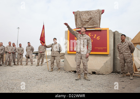 U.S. Marine Corps Lt. Col. Jason S. Guello, commanding officer, Marine Aviation Logistics (MALS) 16, Marine Aircraft Group 16, 3rd Marine Aircraft Wing (Forward), speaks to Marines and Sailors during a dedication at Camp Bastion, Helmand province, Afghani
