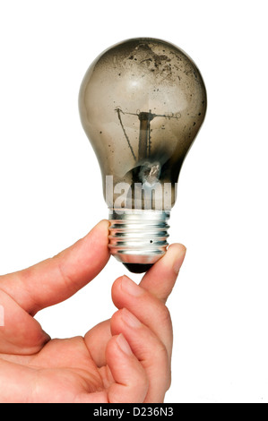 Old light bulb burned inside Stock Photo