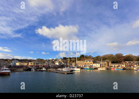 Padstow in Cornwall England UK taken looking across the harbour at the shops and restaurants on a bright sunny afternoon. Stock Photo