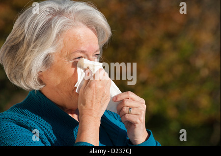 Elderly woman has flu Stock Photo