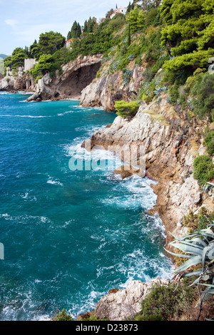 Cliffs on the Adriatic Sea scenic coastline near Dubrovnik in Southern Croatia, Dalmatia region. Stock Photo