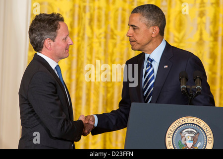 President Barack Obama and outgoing Secretary of the Treasury Tim Geithner.  Stock Photo