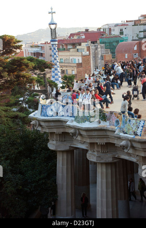 Tourists at main terrace with Doric columns, Gaudi, Parc Guell, Catalunya, Catalonia, Barcelona, Spain. Stock Photo