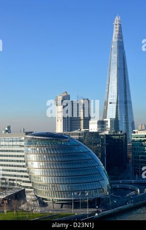 City Hall Guys NHS hospital & Shard landmark skyscraper building on a blue sky day in Southwark London cityscape urban skyline landscape England UK Stock Photo