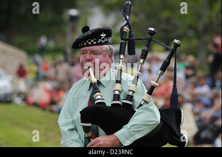 Piping contestant at Killin Highland Games 2011 Stock Photo