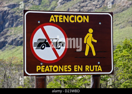 Sign warning of pedestrians on road, Los Glaciares National Park, Patagonia, Argentina Stock Photo