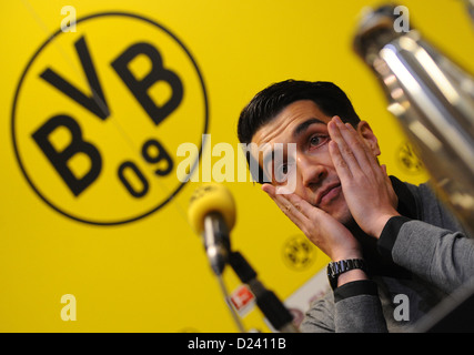 Professional soccer player Nuri Sahin is presented as the new acquisition of Bundesliga soccer club Borussia Dortmund at a press conference in Dortmund, Germany, 11 Jauary 2013. Nuri Sahin transferred to Real Madrid after the Bundesliga season 2010/2011, was then on aloan spell from Real Madrid to FC Liverpool and now returned to Dortmund. Photo: DANIEL NAUPOLD Stock Photo