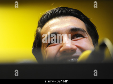 Professional soccer player Nuri Sahin is presented as the new acquisition of Bundesliga soccer club Borussia Dortmund at a press conference in Dortmund, Germany, 11 Jauary 2013. Nuri Sahin transferred to Real Madrid after the Bundesliga season 2010/2011, was then on aloan spell from Real Madrid to FC Liverpool and now returned to Dortmund. Photo: DANIEL NAUPOLD Stock Photo