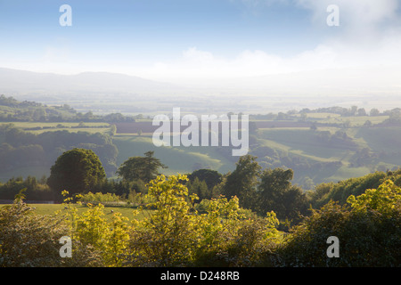 Misty morning over the Gloucestershire and Worcestershire landscape, England Stock Photo