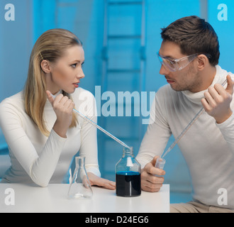 man and woman in laboratory Stock Photo
