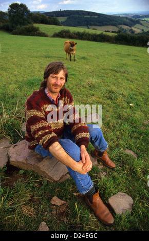 The late organic farmer Mark Purdey with his cattle in Devon, UK. Stock Photo