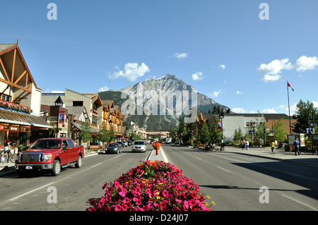 BANFF, CANADA - AUGUST 04: street view of famous Banff Avenue in a sunny summer day on Augist 04, 2011 in Banff, Alberta Stock Photo