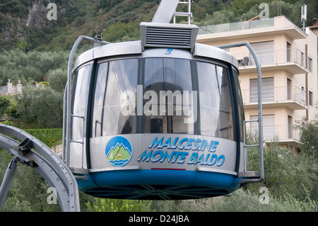 The Funivia Malcesine Monte Baldo cable car connecting the medieval town of Malcesine and Monte Baldo on the eastern shore of Lake Garda in the Veneto Stock Photo