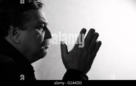 middle-aged man photographed in profile Stock Photo