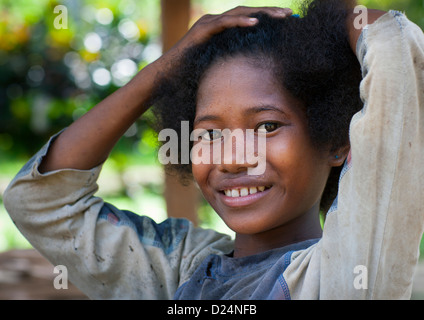 Young Girl Smiling, Trobriand Island, Papua New Guinea Stock Photo