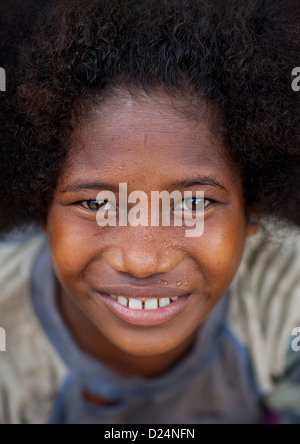 Young Girl Smiling, Trobriand Island, Papua New Guinea Stock Photo