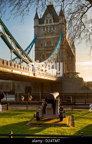 Tower Bridge in late afternoon light viewed from North side of river Thames and tower of London. Stock Photo